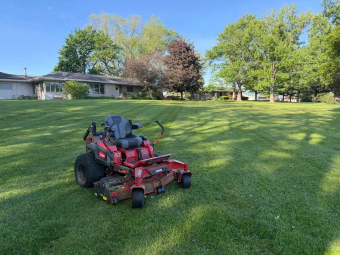 Lawn mowing in Camanche, IA with clean stripes