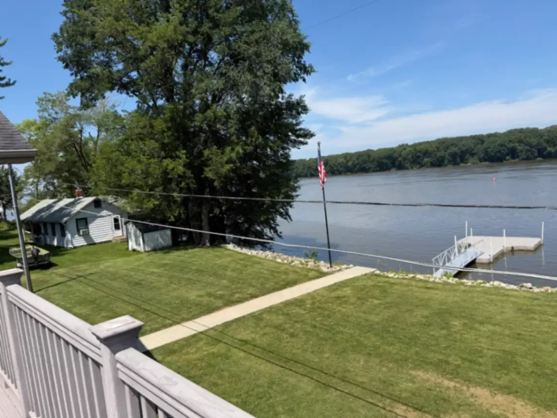 Lawn care and yard cleanup in Thomson, IL along Route 84